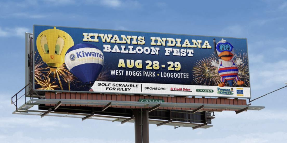 Billboard for the Kiwanis Indiana Balloon Fest on August 28–29 at West Boggs Park in Loogootee, featuring hot air balloon artwork and IU Credit Union listed as a sponsor.